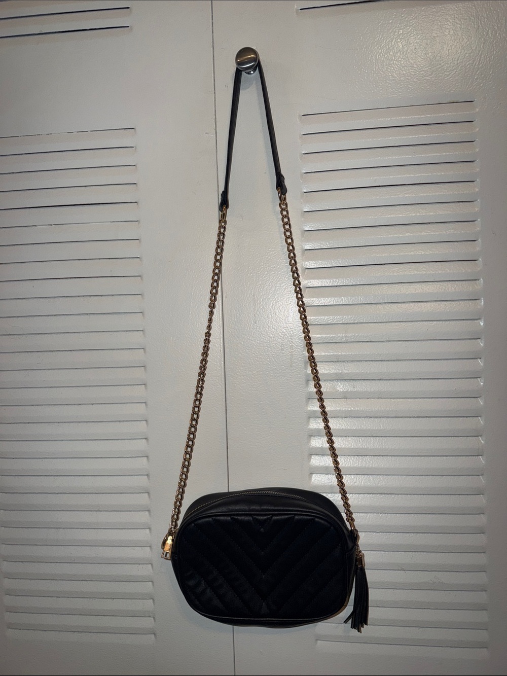 Black Quilted Crossbody Bag with Gold Chain and Tassel